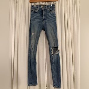 Light blue distressed jeans from Zara
